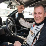 Jeroen Dik sitting in a racing car looking in quite energetic mood